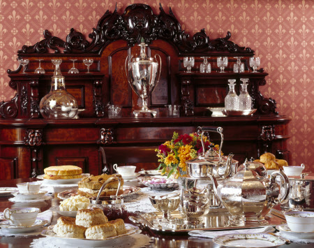 Close-up of the dining table laid with a tea service used by Miss Chichester in the Dining Room at Arlington Court