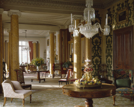 The Morning Room at Arlington Court with a collection of fruit on the table in the foreground