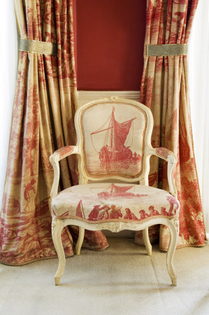 A Louis XV chair upholstered in toile de Jouy in the Octagon Room at Plas Newydd, on the Isle of Anglesey, Wales