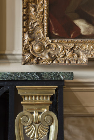 Detail of the corners of a marble-topped side table and a framed painting in the Great Hall at Ham House, Richmond upon Thames, Surrey