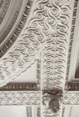 Close detail of the plasterwork ceiling on the Great Staircase at Ham House, Richmond upon Thames, Surrey.