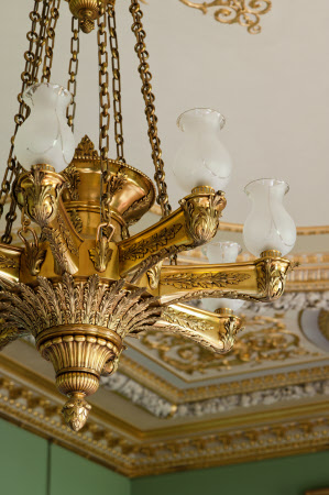 Close view of part of the chandelier in the Dining Room at Wimpole Hall, Cambridgeshire.